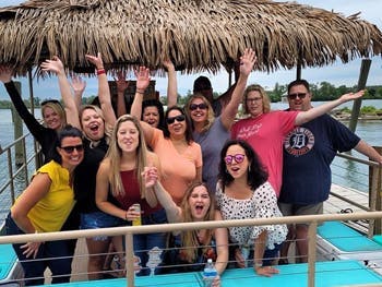 Family Group on boat waving